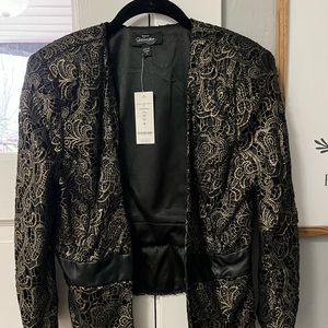 BEBE Women’s Black with Gold accent jacket size 6 (size medium or small NWT